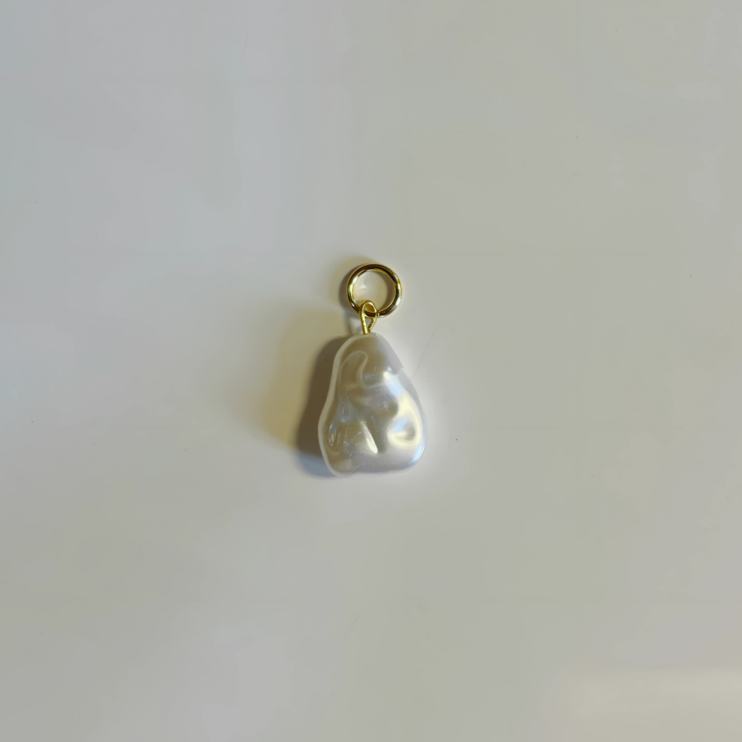 Uneven Pearl Charm
