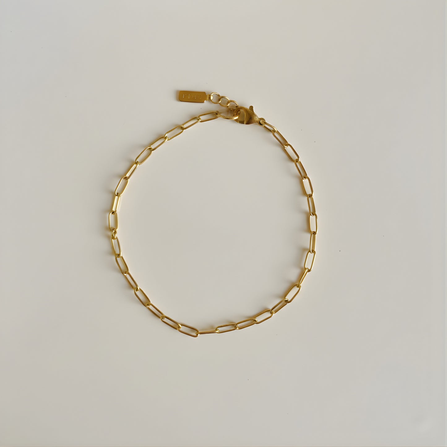 Small paper clip multi charm bracelet
