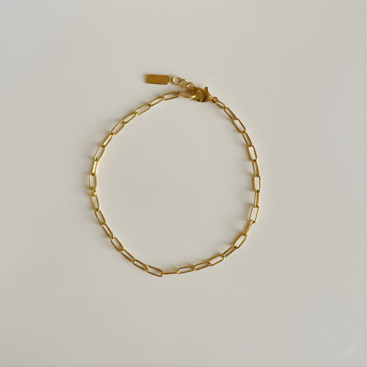 Small paper clip multi charm bracelet